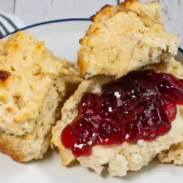 Best cathead biscuits recipe served with generous portions of butter and jelly.