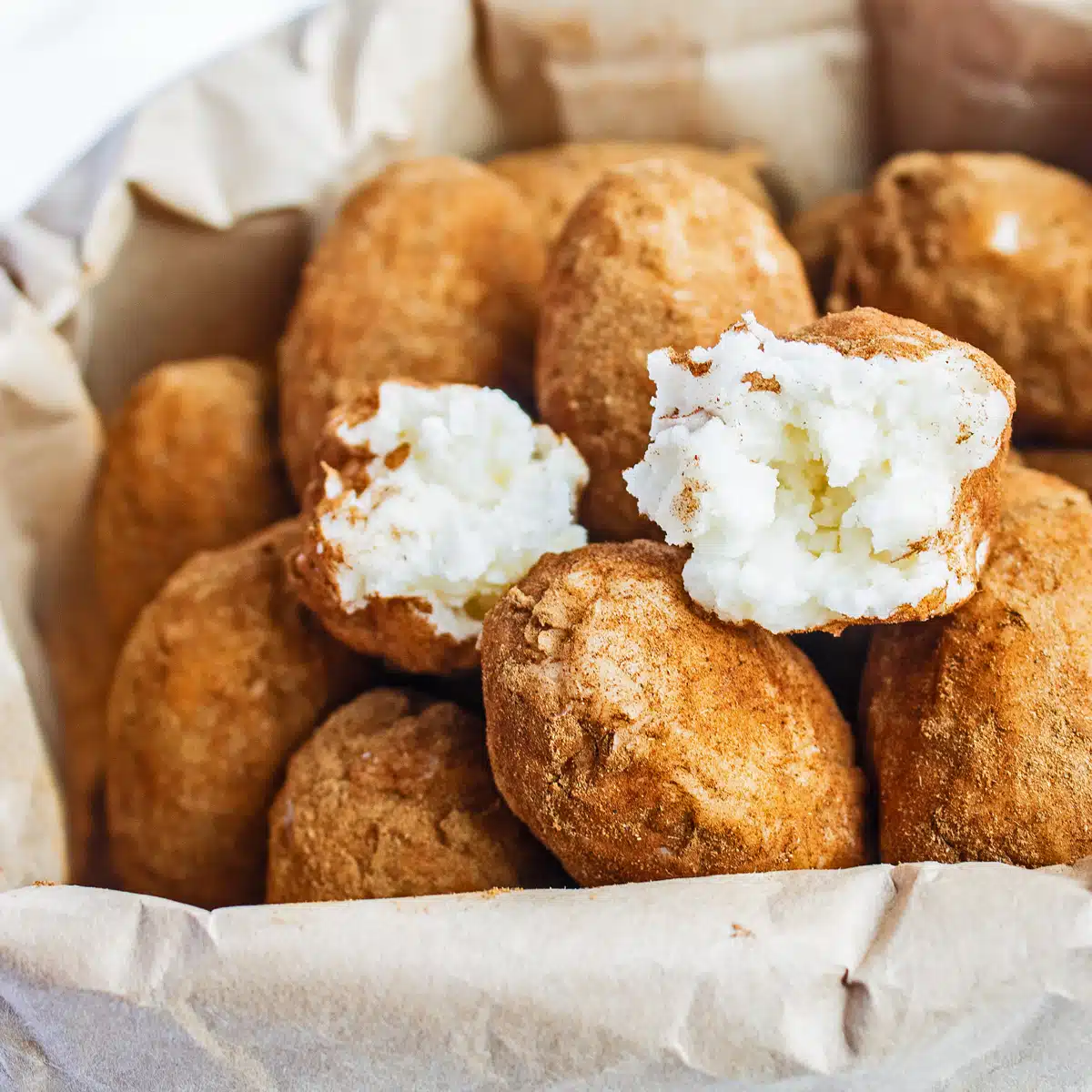 Best Irish potato candy recipe makes these incredibly cute potato shaped balls of creamy coconut filling rolled in cinnamon.