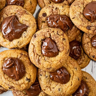 Best peanut butter Nutella cookies with extra dollops of tasty Nutella chocolate hazelnut spread added on top of the chewy cookies.