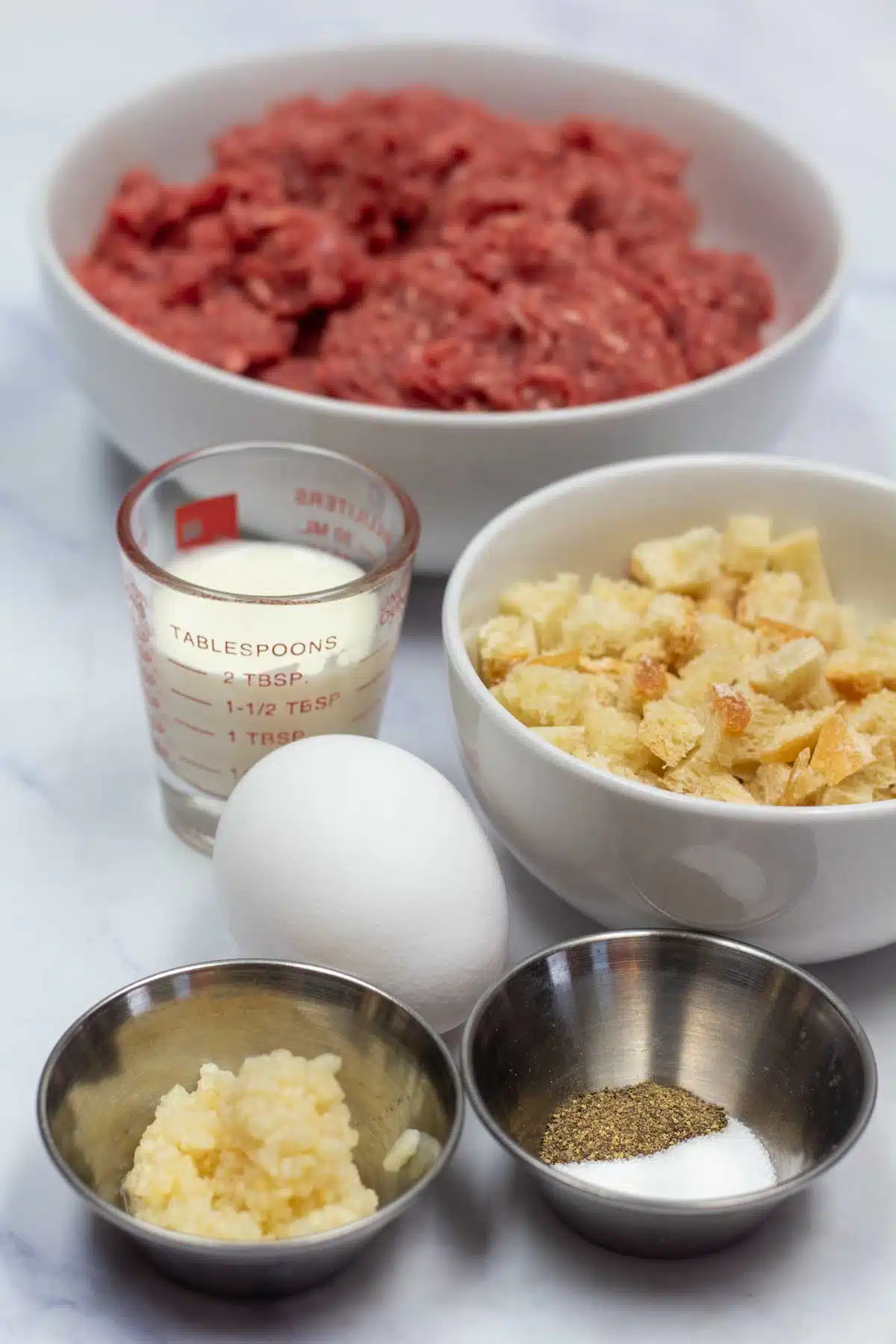 Tall image showing air fryer meatball ingredients.