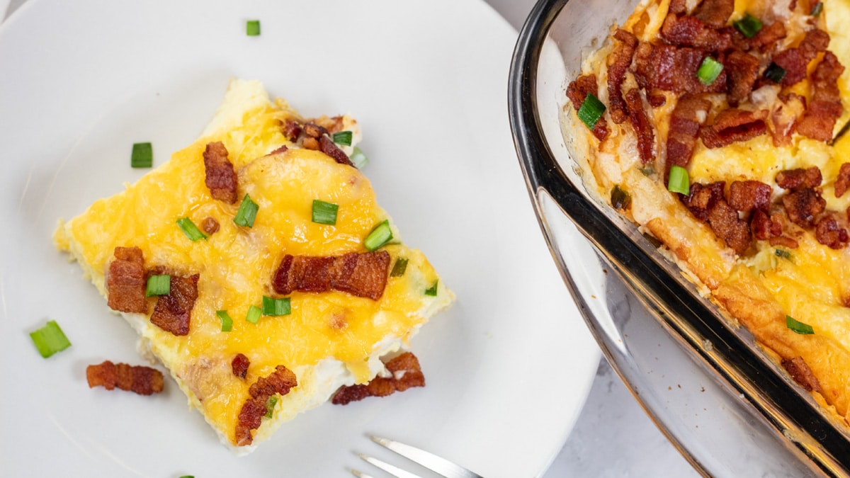 Wide overhead image of bacon breakfast casserole.