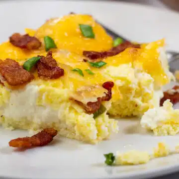 Wide close up image of bacon breakfast casserole.