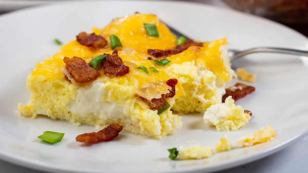 Wide close up image of bacon breakfast casserole.