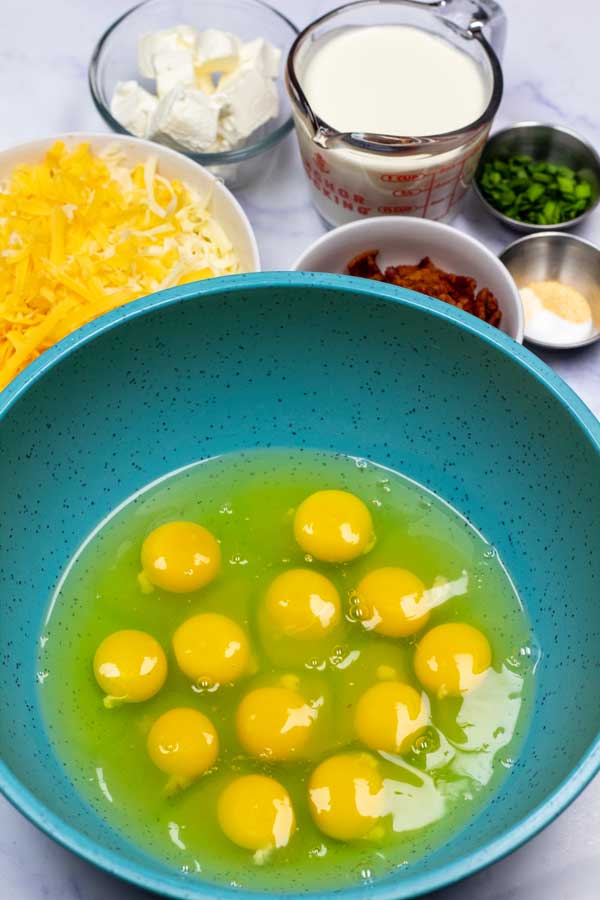 Process image showing cracked eggs in a mixing bowl.