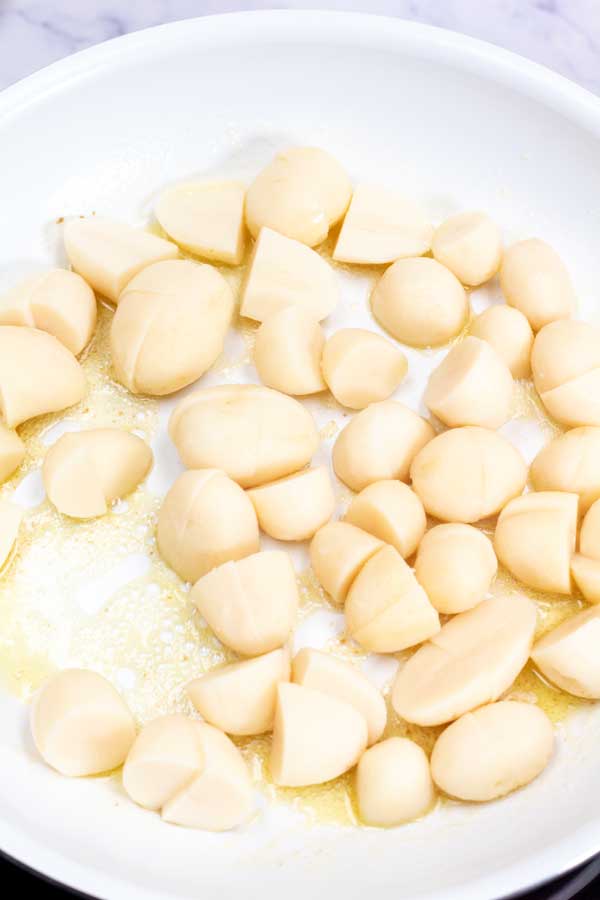 Process image 4 showing potatoes added to pan.