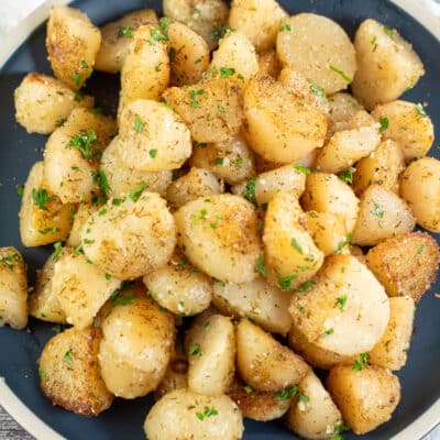 Square image showing cooked canned potatoes.