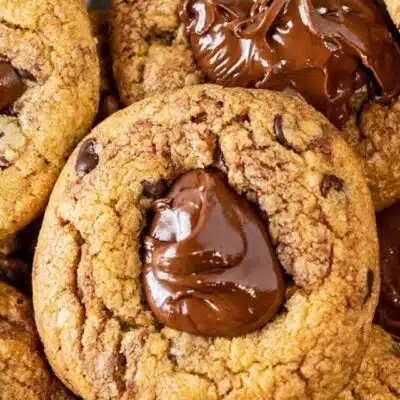 Best peanut butter Nutella cookies stacked on light background and pictured up close.