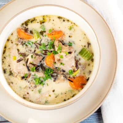Square image of duck and wild rice soup.