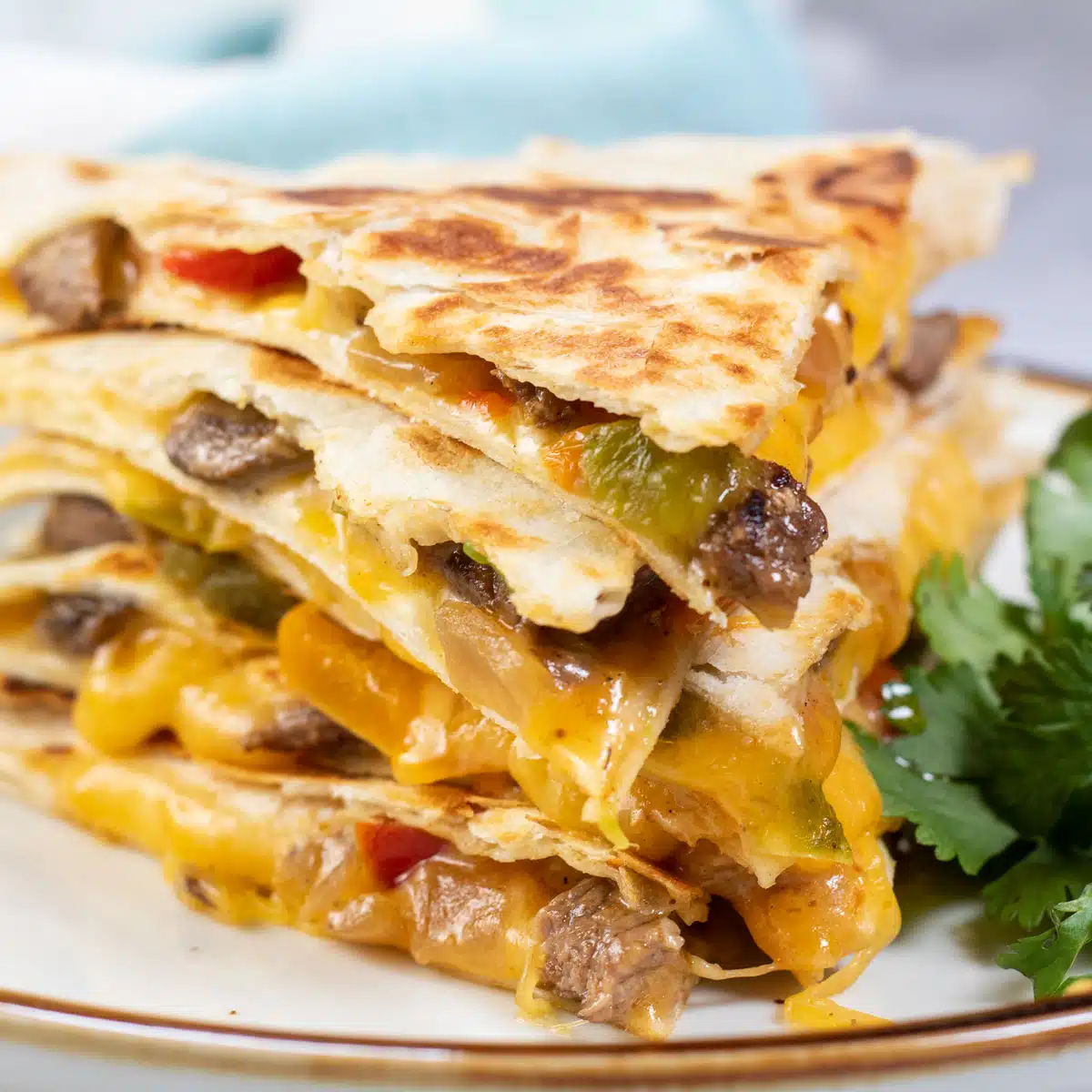 Square image of fajita quesadillas.