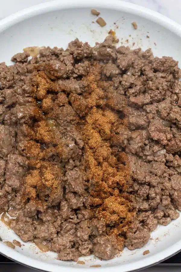 Process image 4 showing browned hamburger with seasoning.