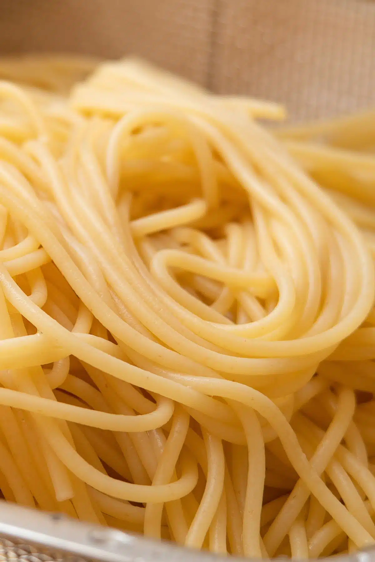 Tall image of spaghetti noodles.