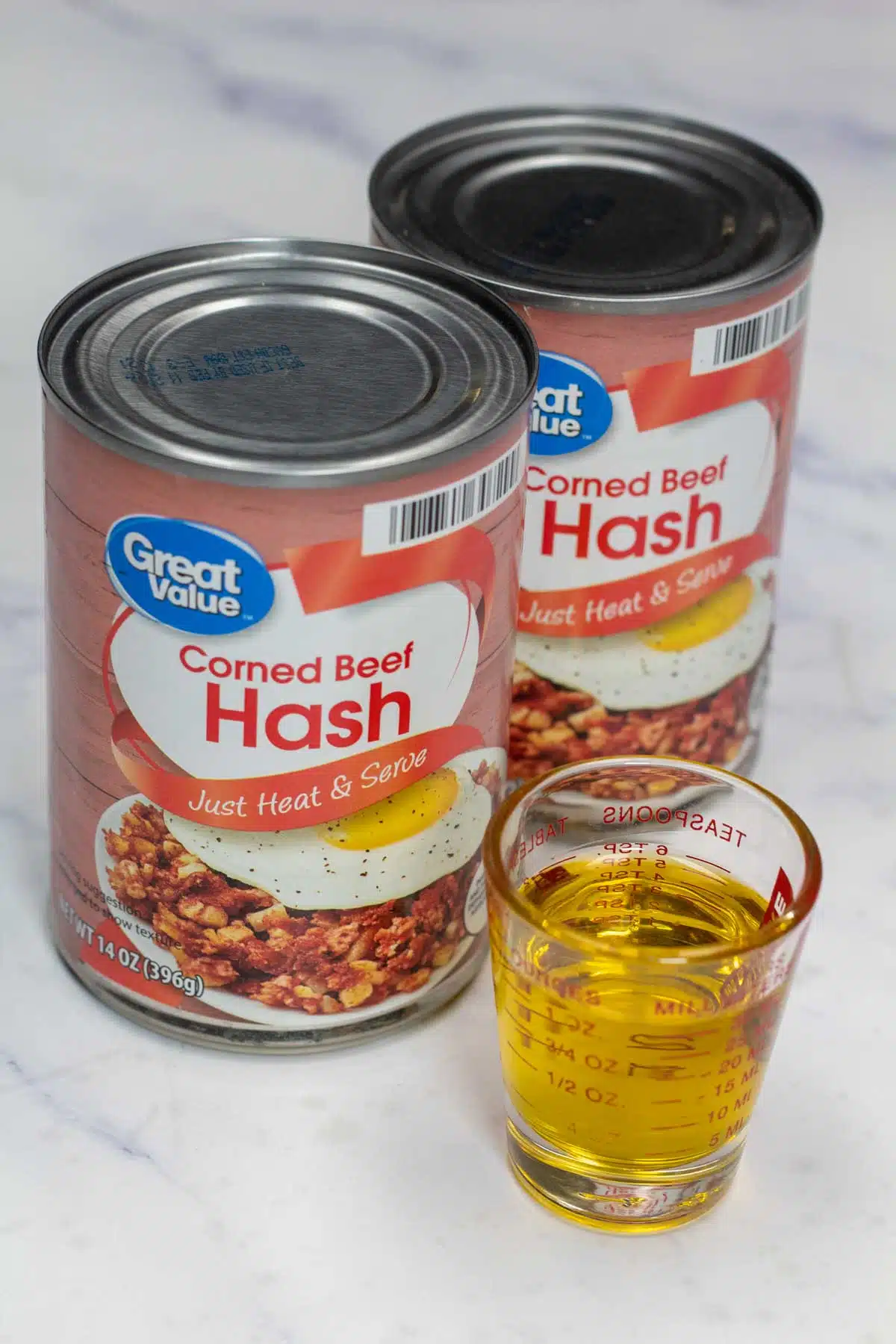 Tall image showing ingredients for canned corned beef hash.