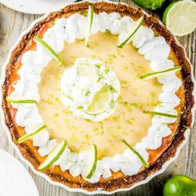 Square image of a whole key lime pie.