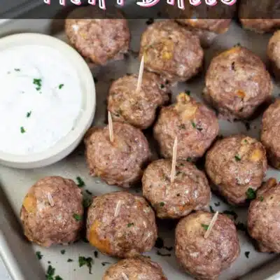 Pin image with text showing lamb meatballs on a metal tray with dipping sauce.