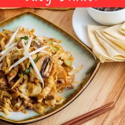Pin image with text of a plate of moo shu pork.