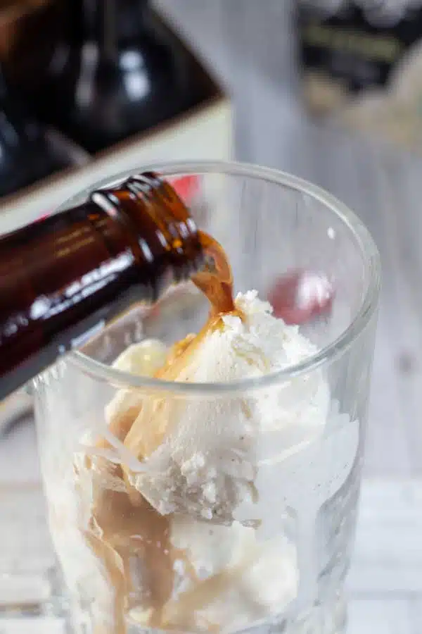 Process image showing pouring root beer over ice cream.