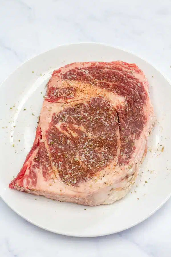 Process image 1 showing seasoned steak.