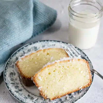 Tender coconut loaf cake is an easy dessert that's holiday worthy for serving up tasty slices like these iced slices.