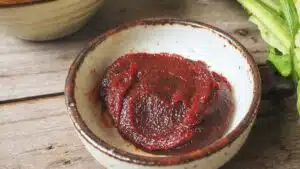 Wide image showing Gochujang in a small bowl.