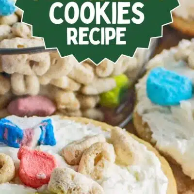Best Lucky Charms cookies recipe pin with closeup image of the frosted marshmallow cereal cookies and text title overlay.