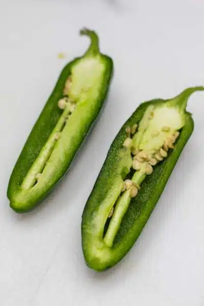Process image 1 showing jalapeno cut in half.