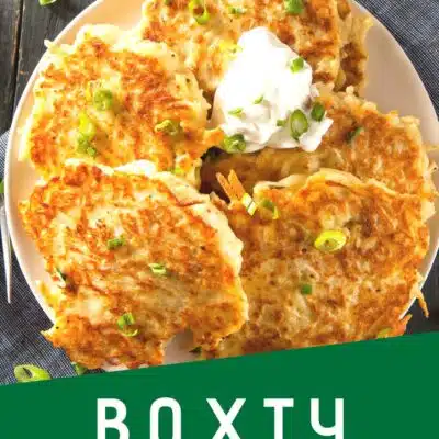 Pin image with text of boxty Irish pancakes on a white plate.