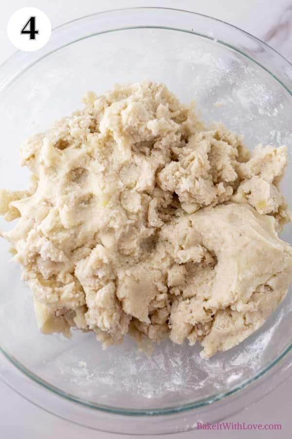 Boxty Irish pancakes process photo 4 showing combined mashed potatoes and flour in a bowl.