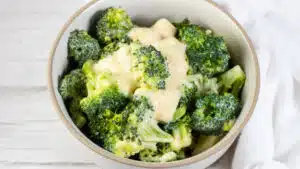 Wide image showing broccoli and cheese.