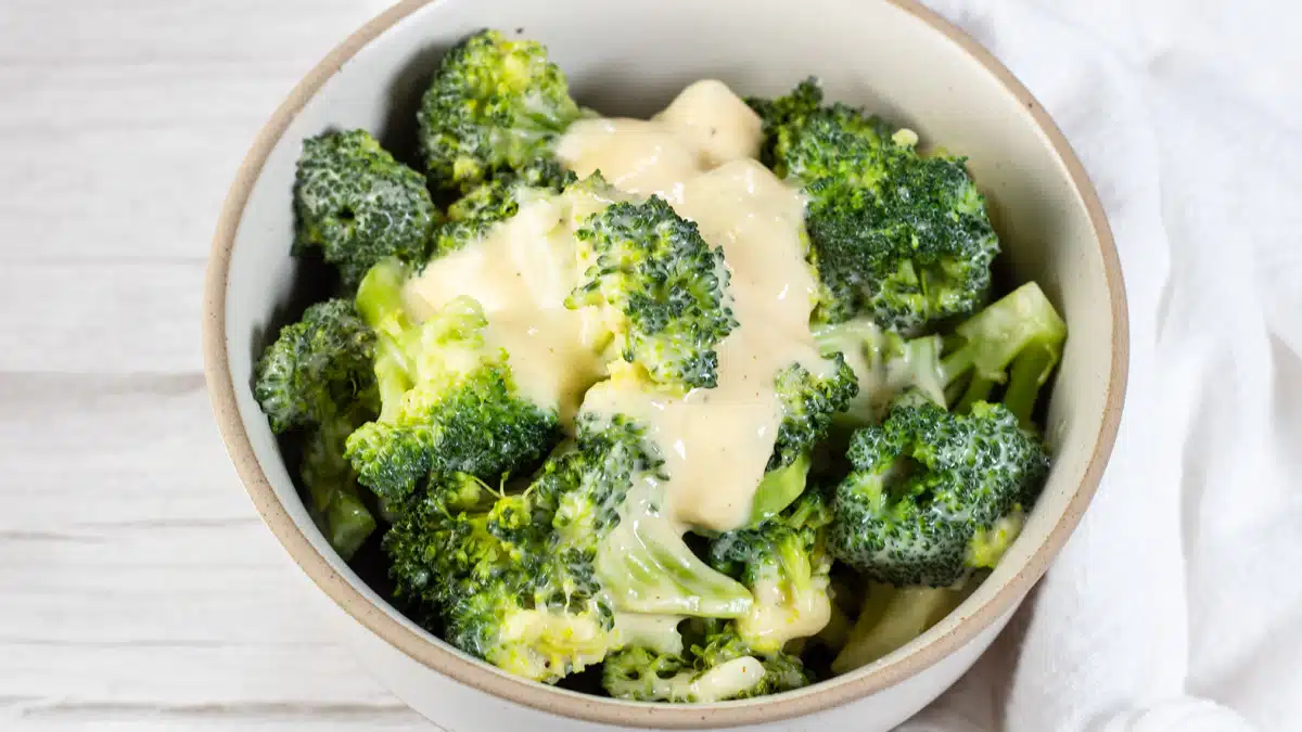 Wide image showing broccoli and cheese.