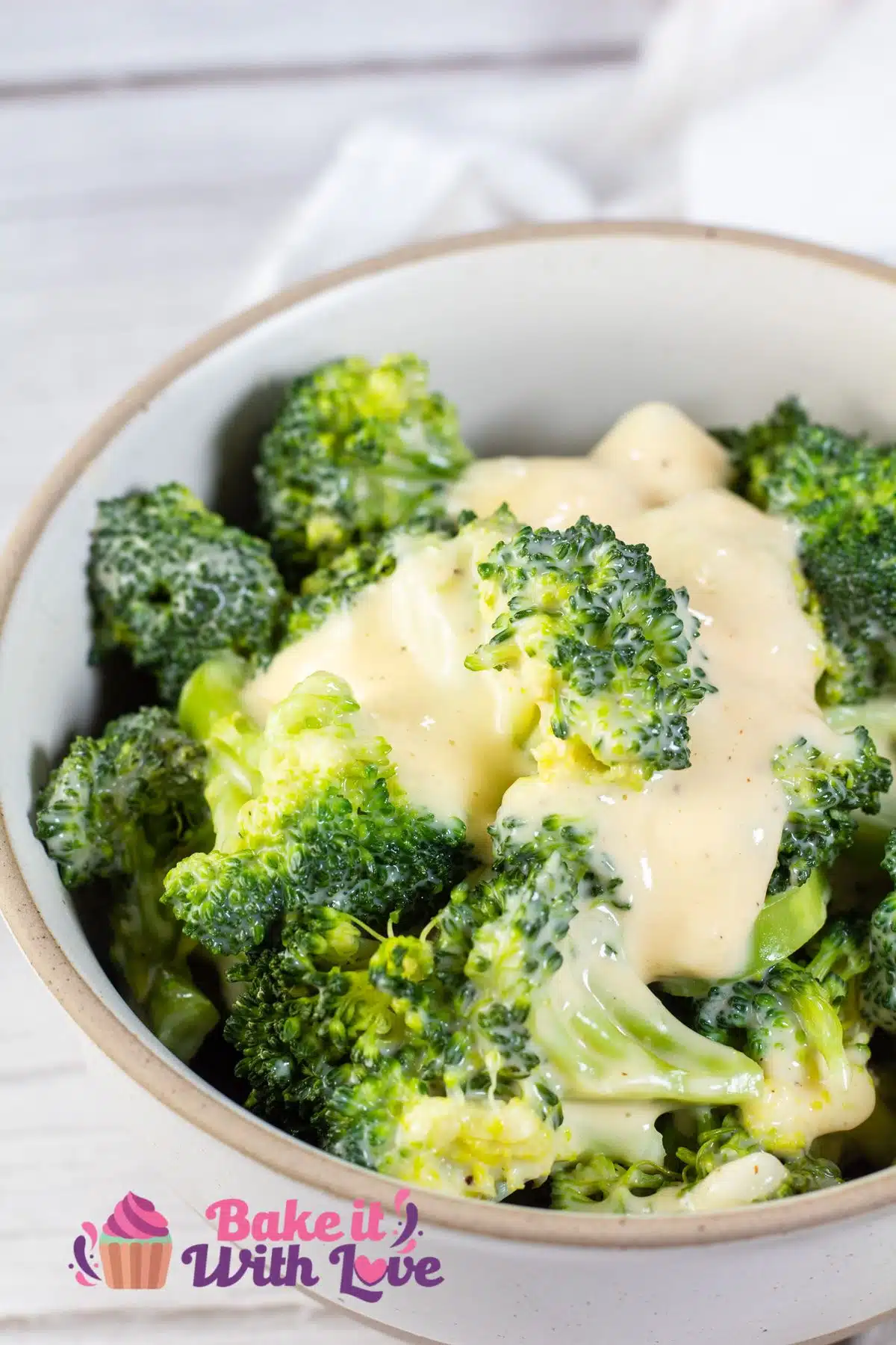 Tall image showing broccoli and cheese.