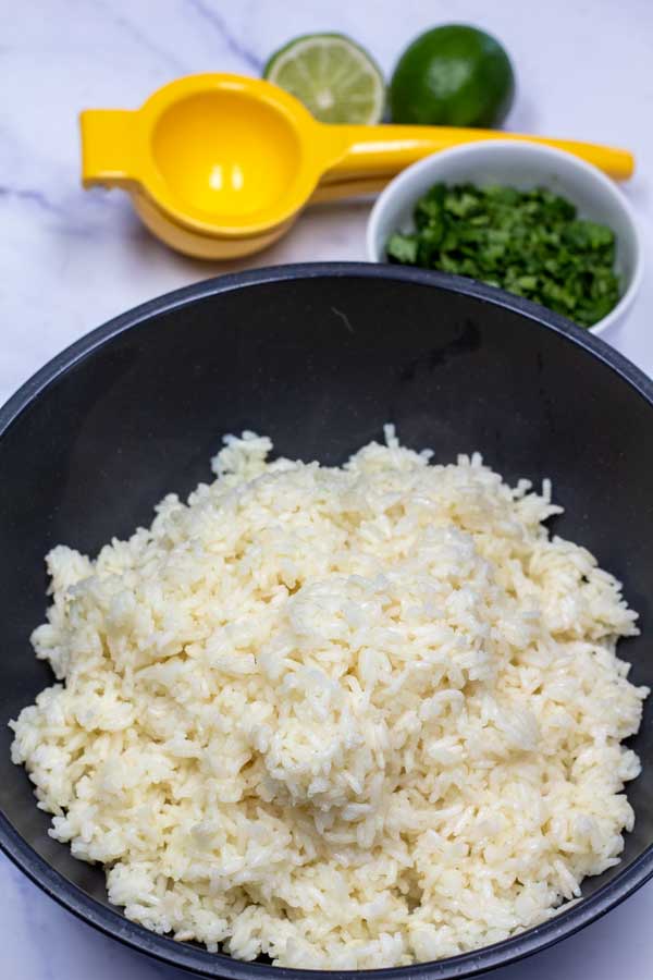 Process image 1 showing rice in a bowl after adding lime juice.