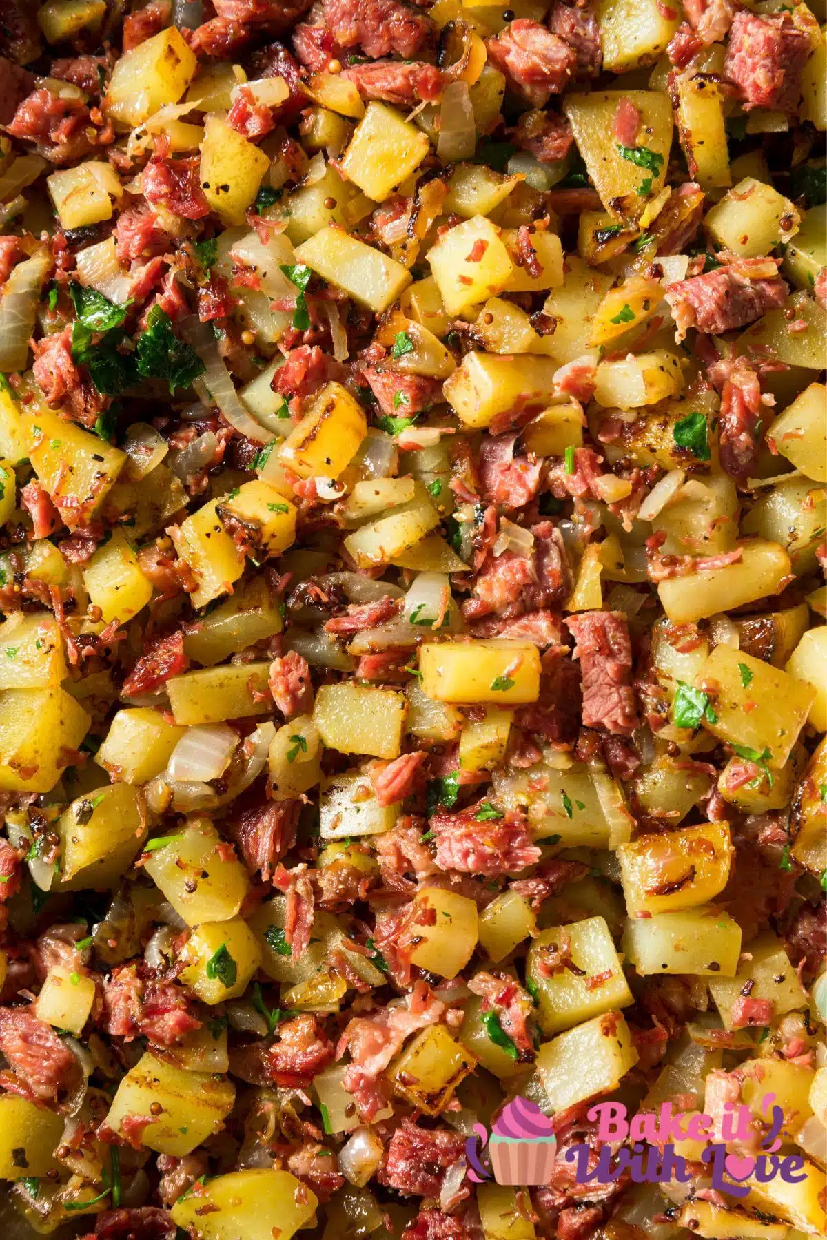 Tall image of corned beef hash in a pan.