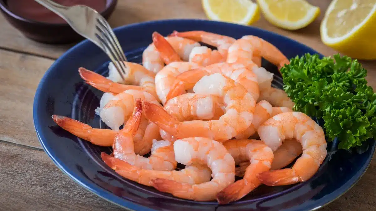 Wide image of shrimp on a plate.