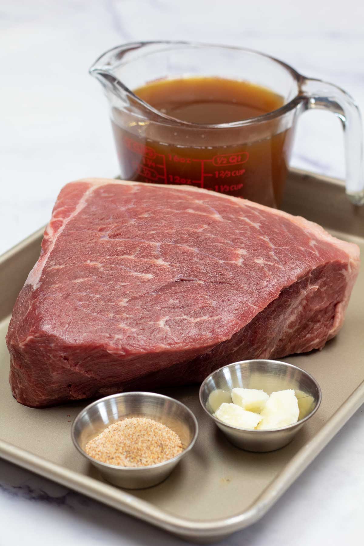 Tall image showing instant pot rump roast ingredients.