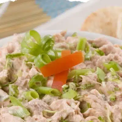Pin image with text of a bowl of tuna dip.