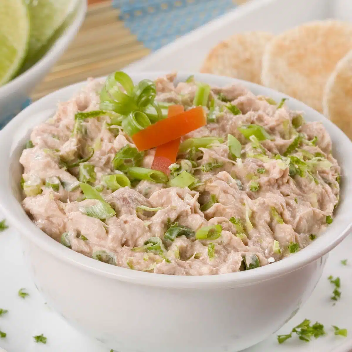 Square image of a bowl of tuna dip.