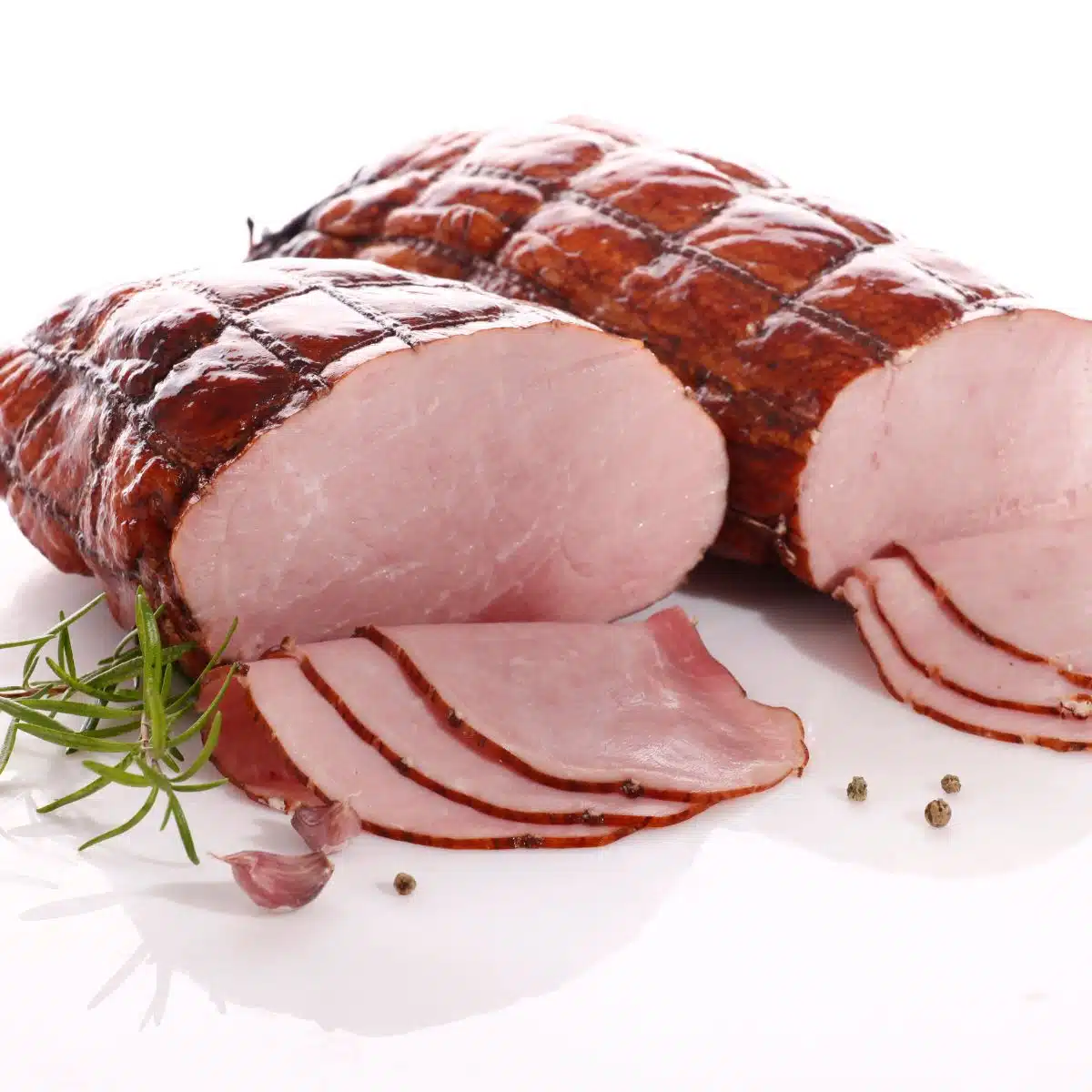 Square image of a couple of hams on a white background.