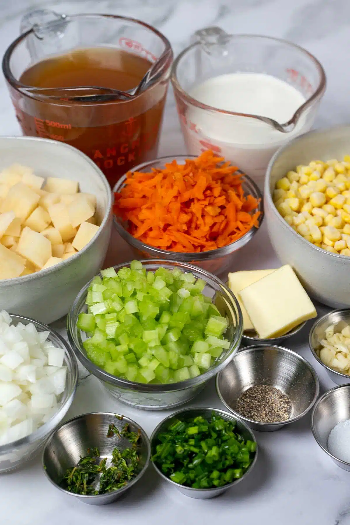 Tall image showing corn soup ingredients.