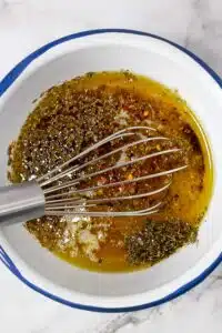 Italian salad dressing recipe process photos 2 whisk the salad dressing together.