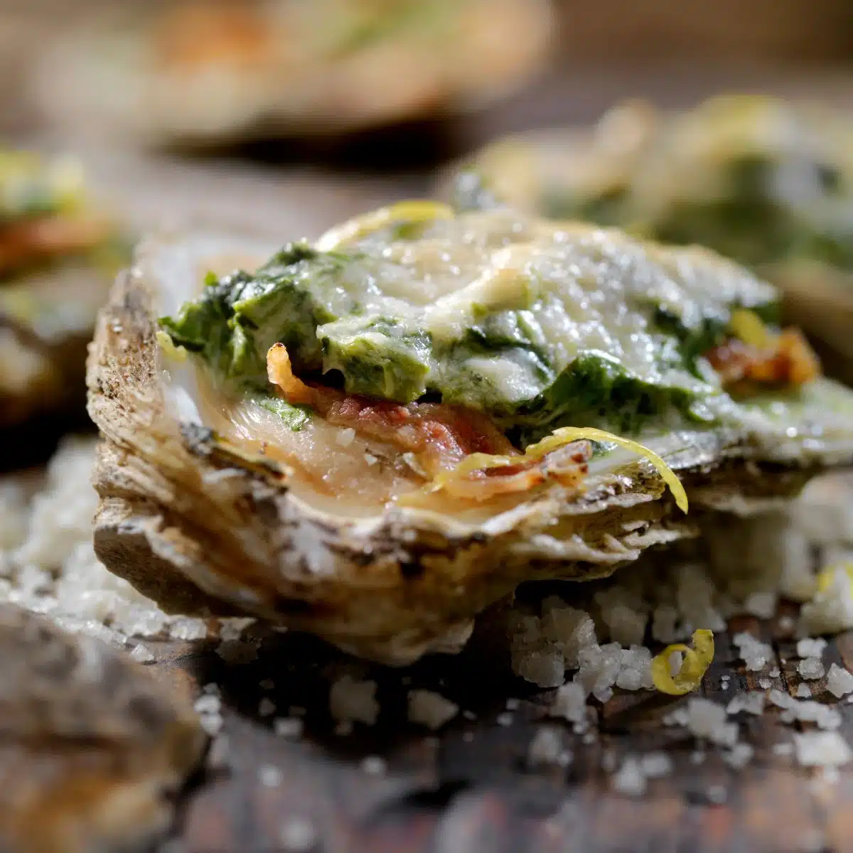 Square image showing oysters Rockefeller.