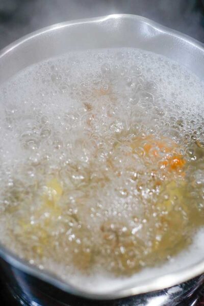 Process image 1 showing boiling pasta noodles.