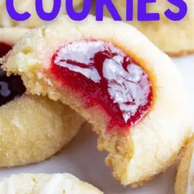 Pin image with text of thumbprint cookies on a plate.