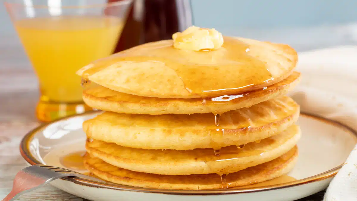 Wide image of a stack of air fryer cooked pancakes.