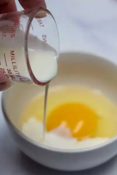 Process image 7 showing making egg wash.