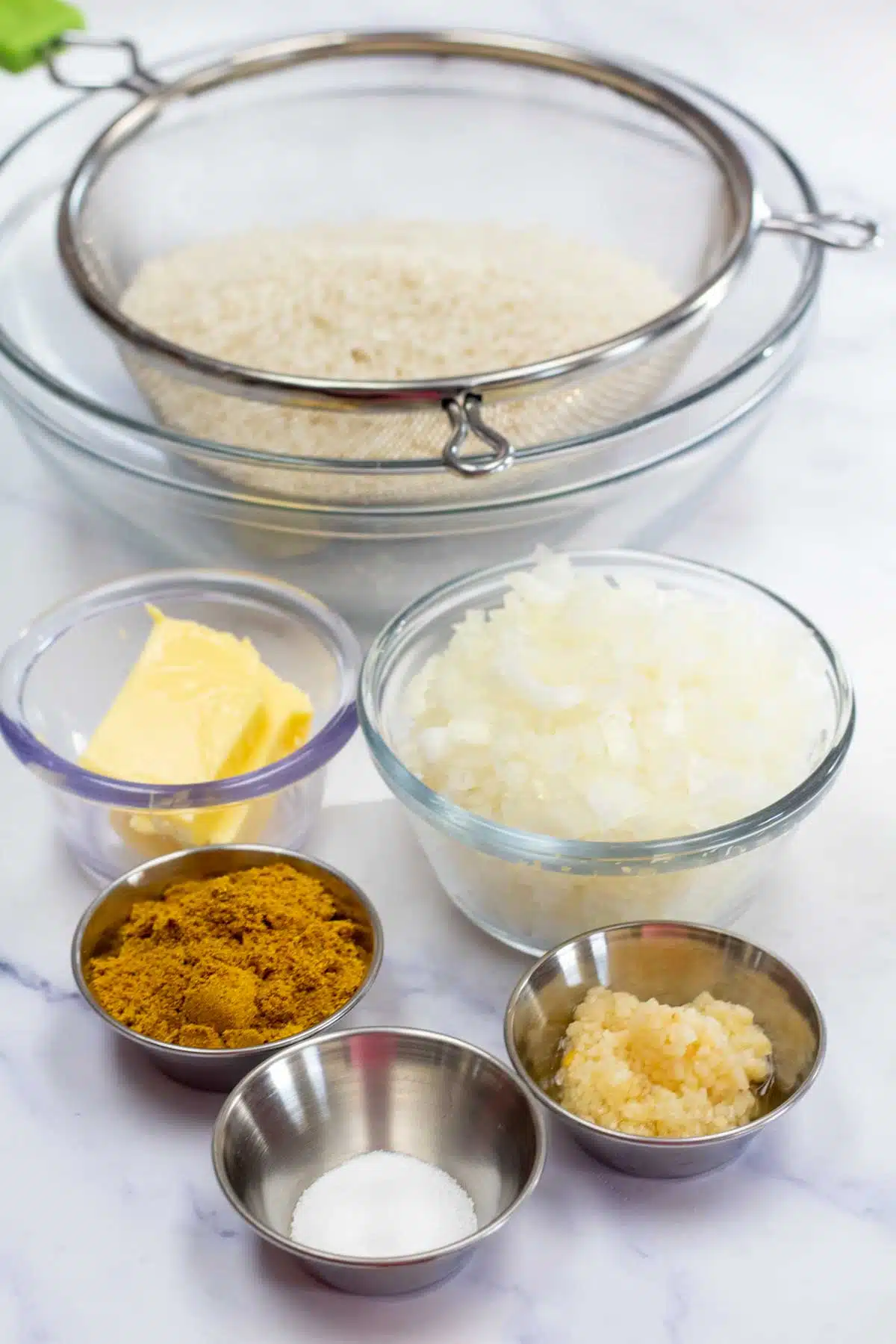 Tall image of ingredients needed for curry rice.