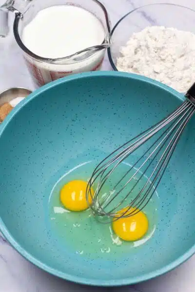 Process image 1 showing eggs in a mixing bowl.