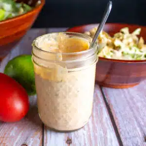 Square image of Tex-Mex dressing in a glass jar.