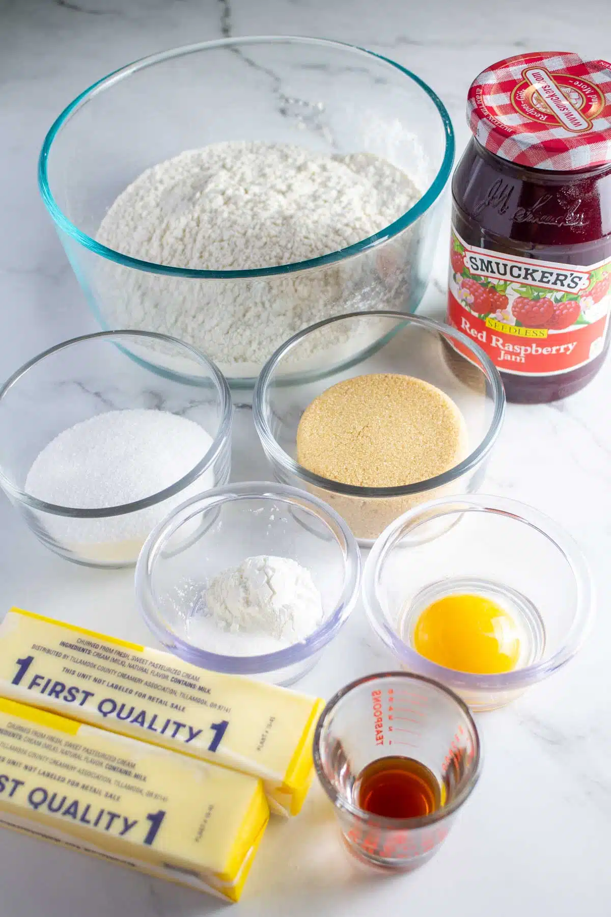 Tall image showing thumbprint cookie ingredients.