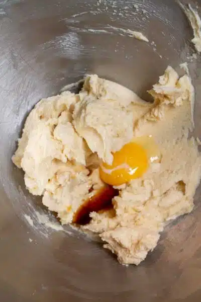 Process image 2 showing added egg and vanilla.