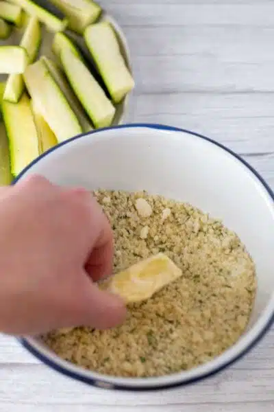 Process image 4 showing coating zucchini in breadcrumbs.